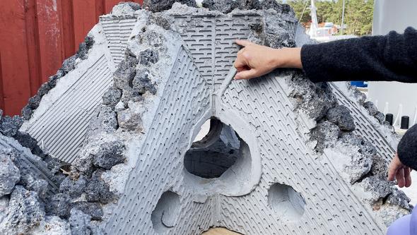 Concrete reefs with small cavities and other structures on their surface to help coral larvae attach. With their hard structures and crevices, they are also a haven for squat lobsters, fish,